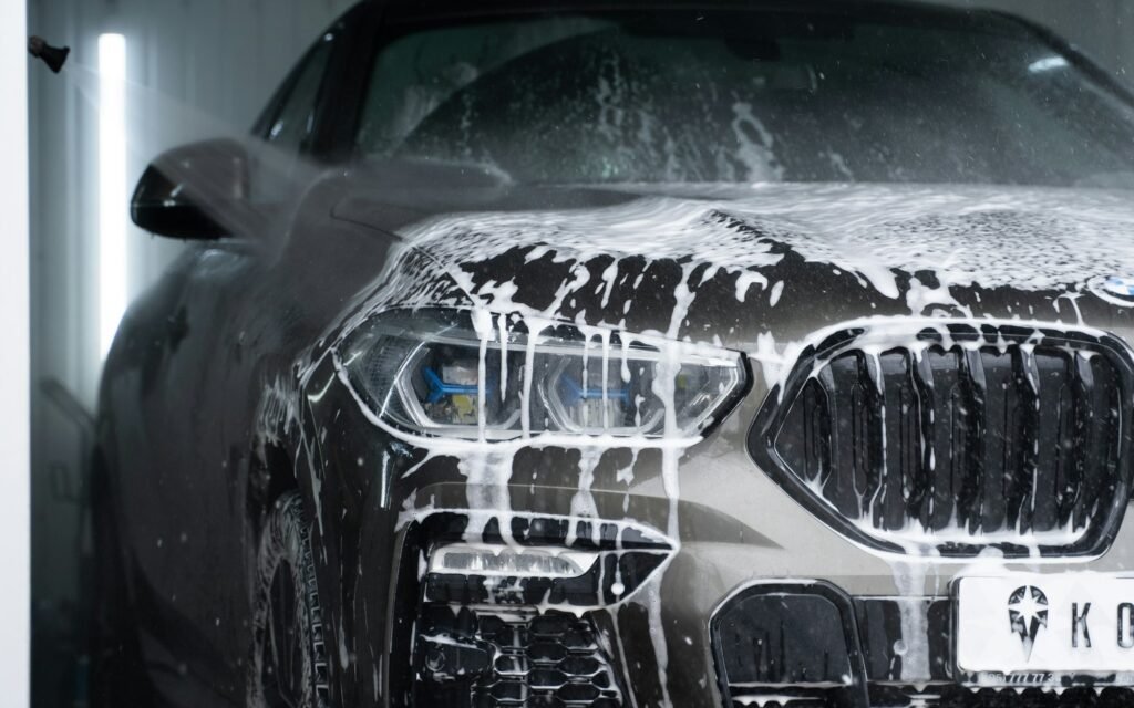 Car being foam washed during a mobile detail in Washtenaw County